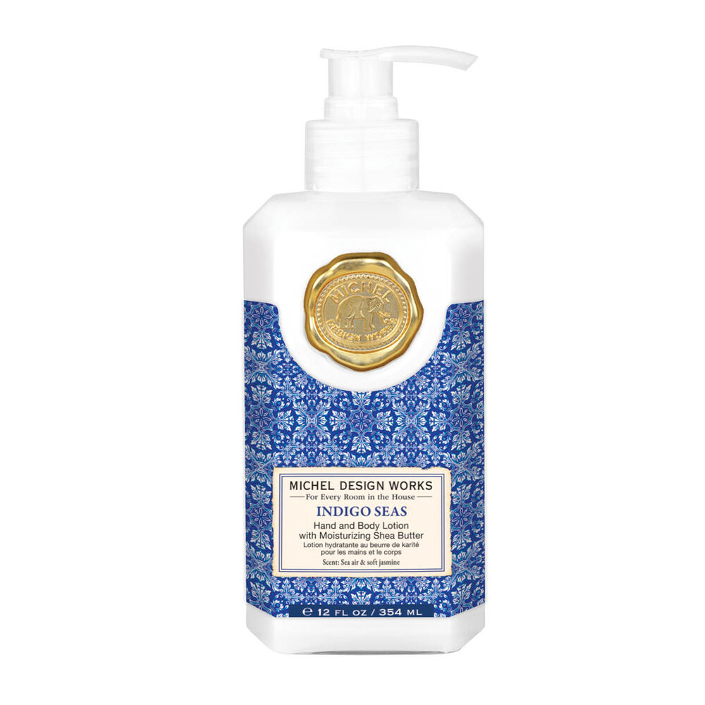 Bottle of Michel Design Works Indigo Seas body lotion on a white background. Available at Be Charmed