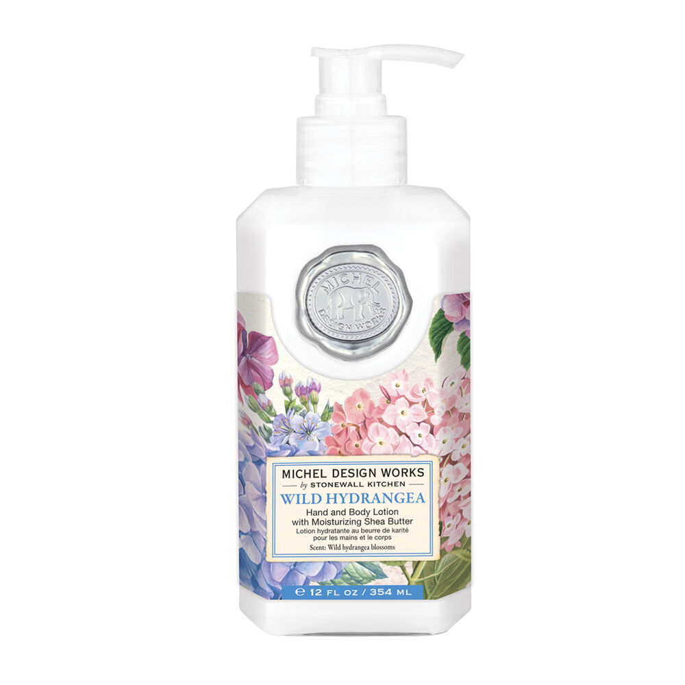 Bottle of Michel Design Works Wild Hydrangea lotion on a white background. Available at Be Charmed