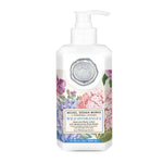 Bottle of Michel Design Works Wild Hydrangea lotion on a white background. Available at Be Charmed