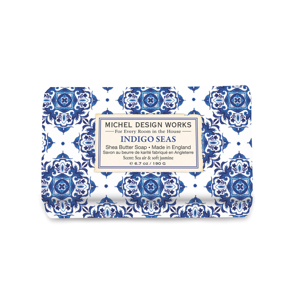Bar of soap with blue and white pattern and Michel Design Works label on a white background. Available at Be Charmed