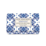 Bar of soap with blue and white pattern and Michel Design Works label on a white background. Available at Be Charmed