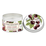 Michel Design Works Dark Cherry candle in a tin with cherry design on lid. Available at Be Charmed