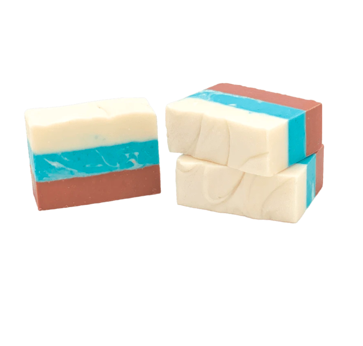Two bars of handmade soap with a swirled pattern, predominantly white with blue and red streaks, stacked on top of each other. Available at Be Charmed