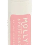 A white lip balm stick with a pink label that reads 'Molly's Apothecary - Creamy'. Available at Be Charmed