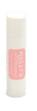 A white lip balm stick with a pink label that reads 'Molly's Apothecary - Creamy'. Available at Be Charmed