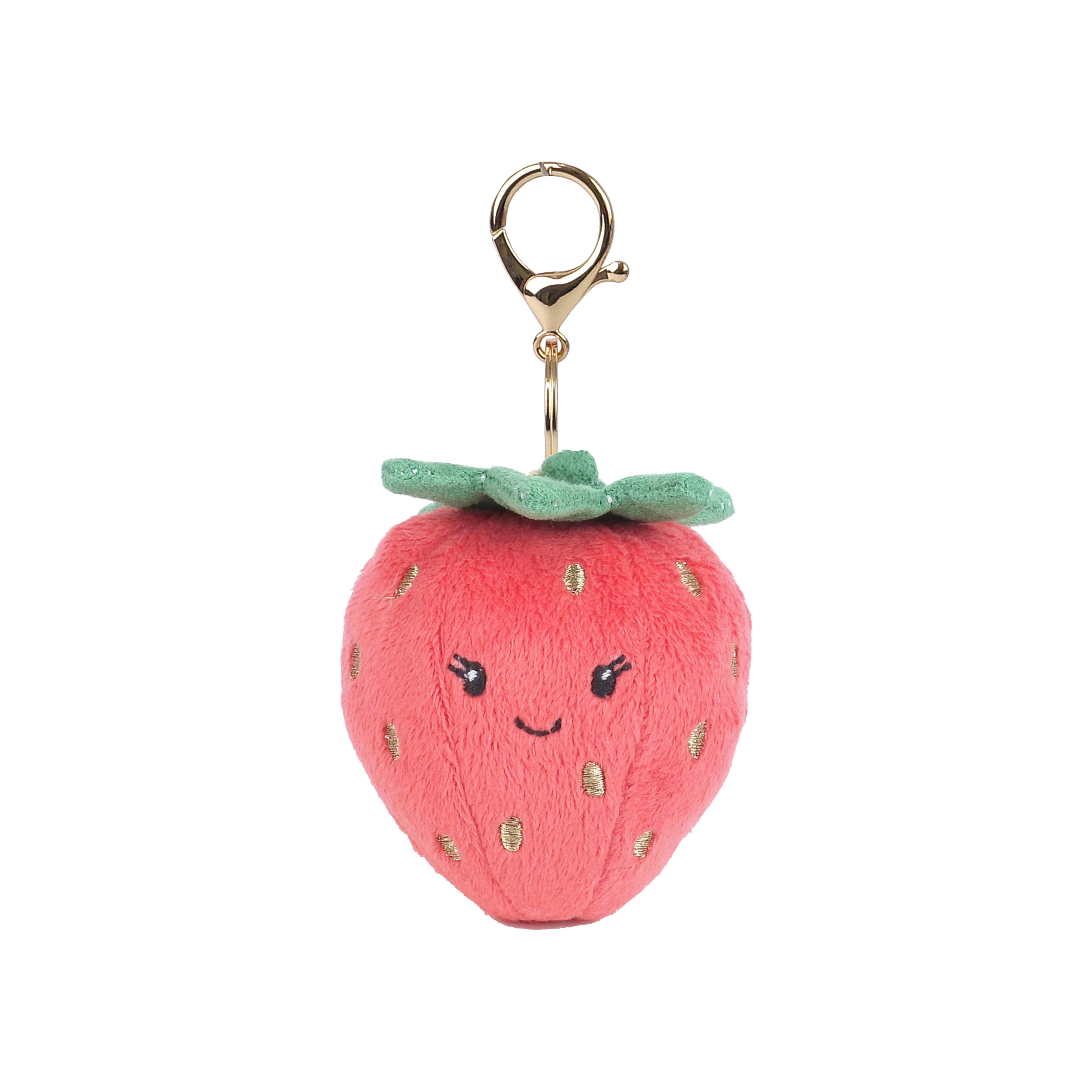 Strawberry-shaped keychain with a smiling face on a white background. Available at Be Charmed