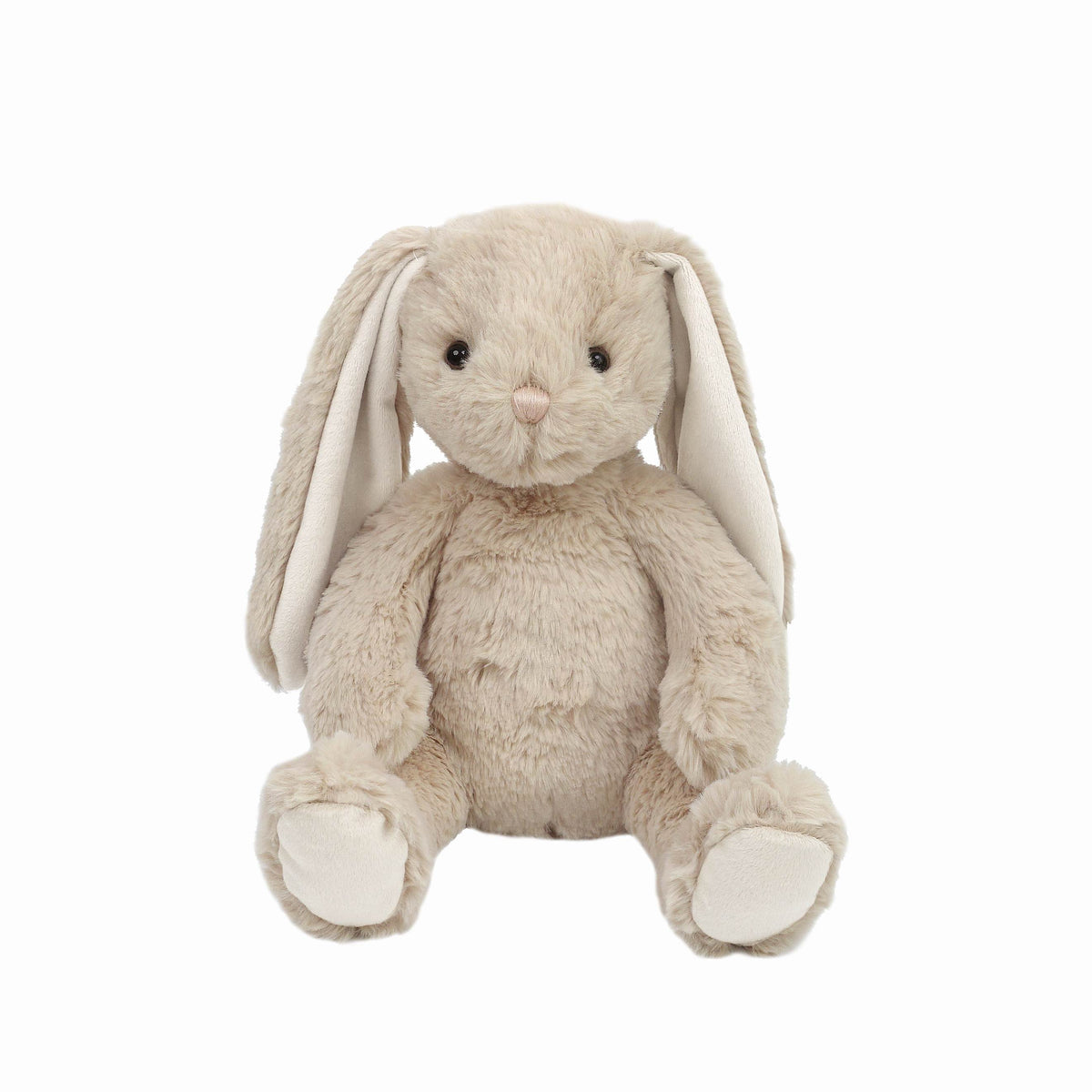 A beige plush toy in the form of a bunny with soft fabric ears and a gentle face. Available at Be Charmed
