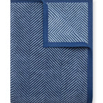 Navy Chappy Wrap Harborview Herringbone Blanket – Original size throw in a classic light grey herringbone pattern. Plush, durable, and machine washable. A cozy neutral accent for the home or perfect gift. Available at Be Charmed.