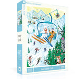 New York Puzzle Co Last Chair Chill 1000 Piece Puzzle – snowy ski scene jigsaw, perfect for winter fun or gifting. Available at Be Charmed