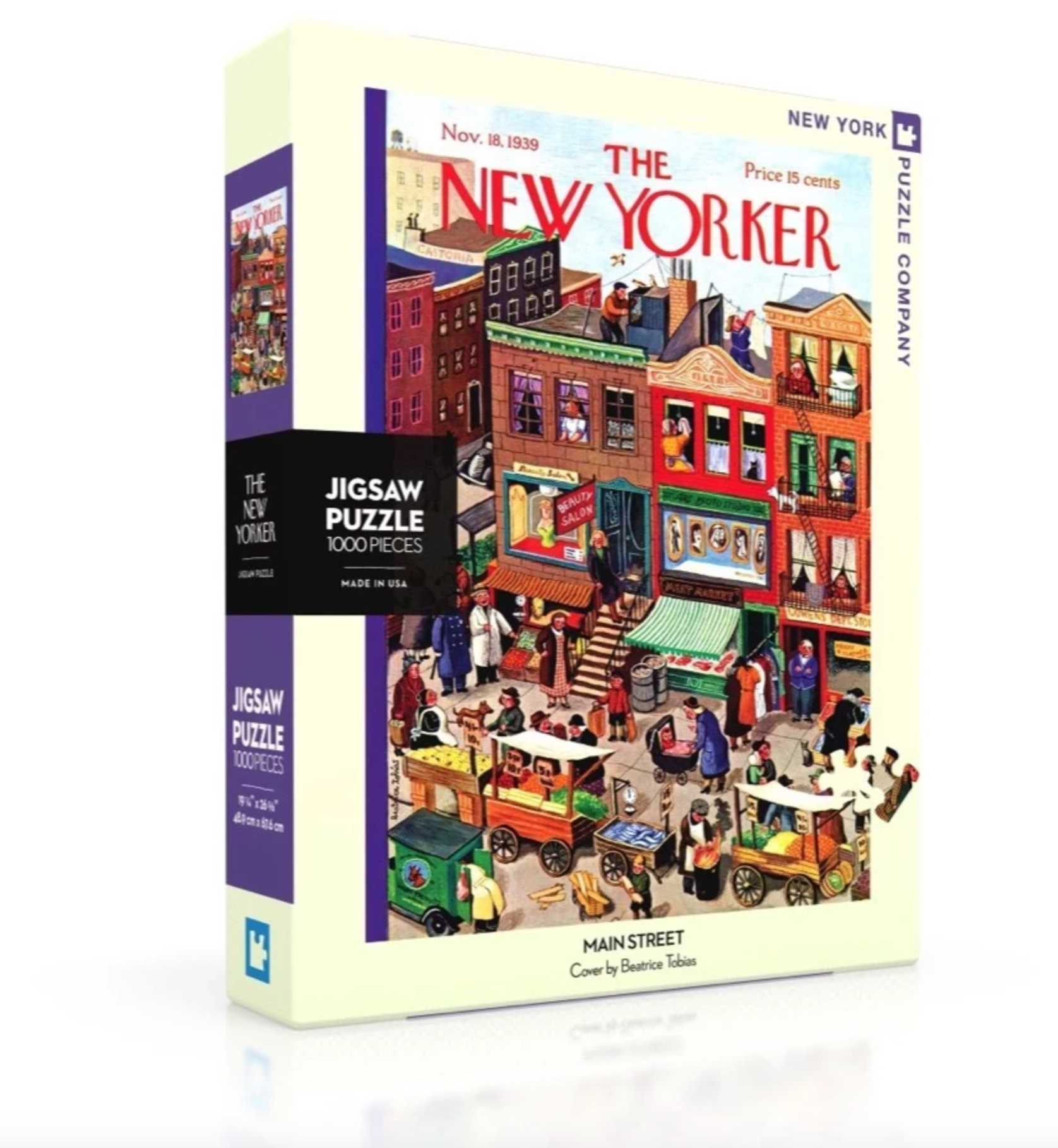 A puzzle box cover featuring a colorful illustration of a bustling Main Street scene with pedestrians and storefronts, titled 'The New Yorker'. Available at Be Charmed