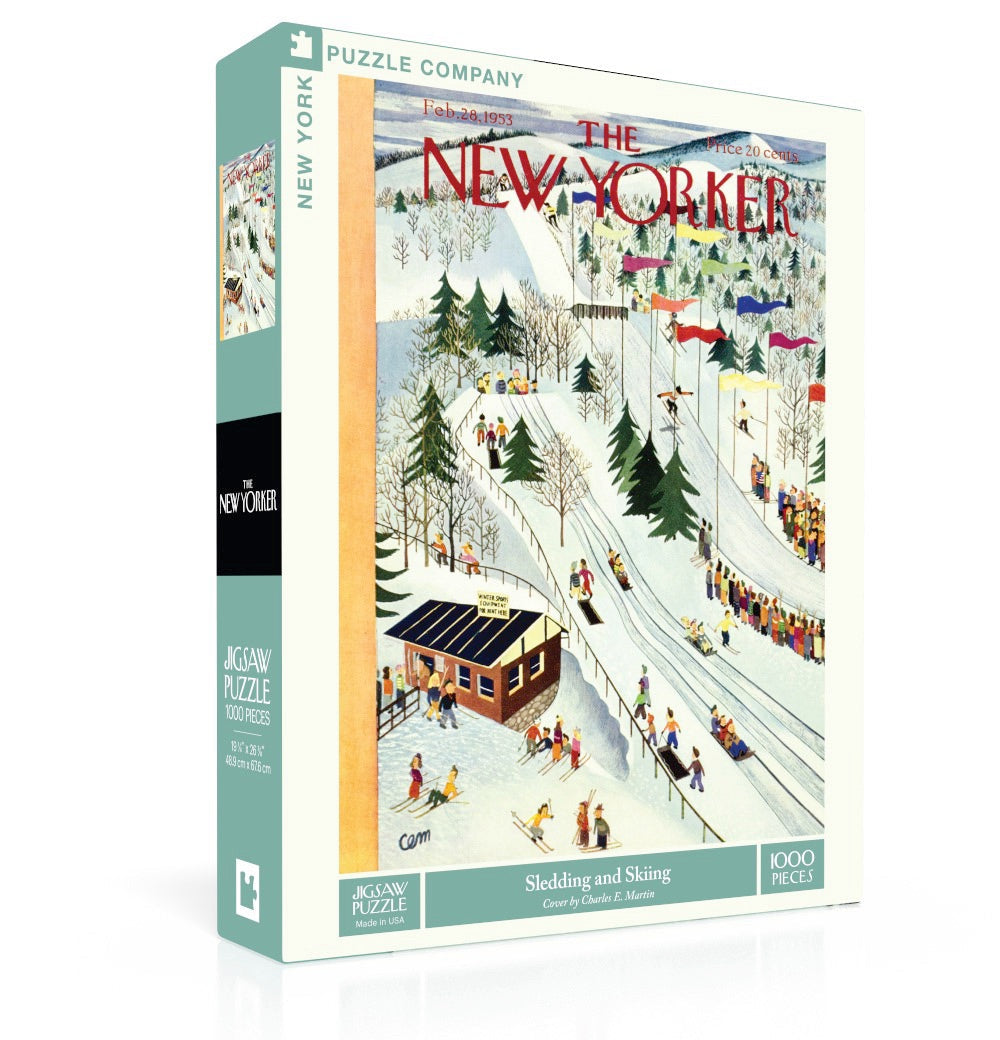 New York Puzzle Co Sledding and Skiing 1000 Piece Puzzle – winter sports jigsaw with snowy fun scene. Available at Be Charmed