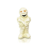 A beige-colored mini mummy-shaped charm with a smiling face. Available at Be Charmed