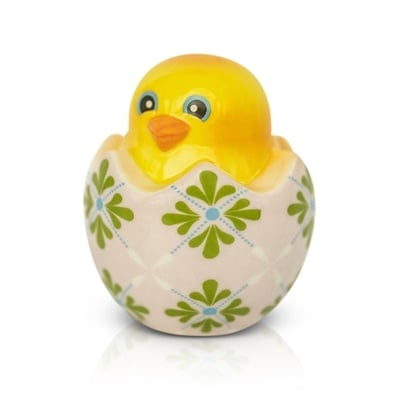 A yellow and green floral-patterned mini charm designed to resemble a duck in an egg-shaped container. Available at Be Charmed