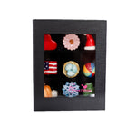 Set of small Nora Fleming minis s in a black box on a white background. Available at Be Charmed