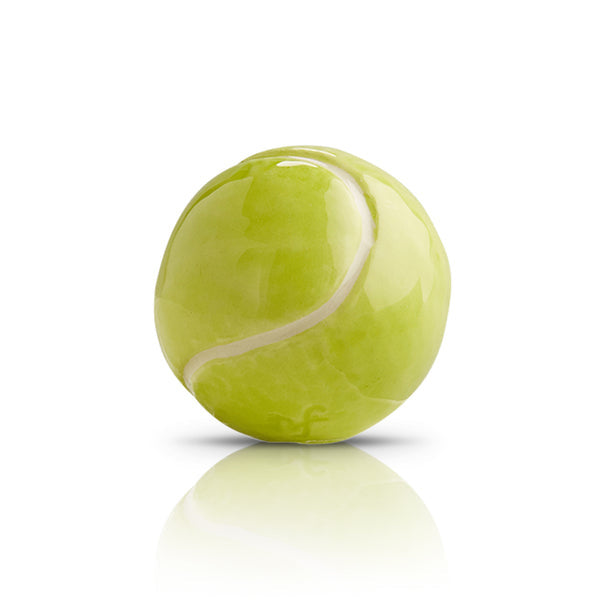 A mini tennis ball-shaped Nora Fleming Mini in green and yellow colors. Available at Be Charmed