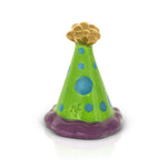 A Nora Fleming Mini ceramic mini figurine resembling a party hat with a green base, blue polka dots, and a gold-colored top. Available at Be Charmed