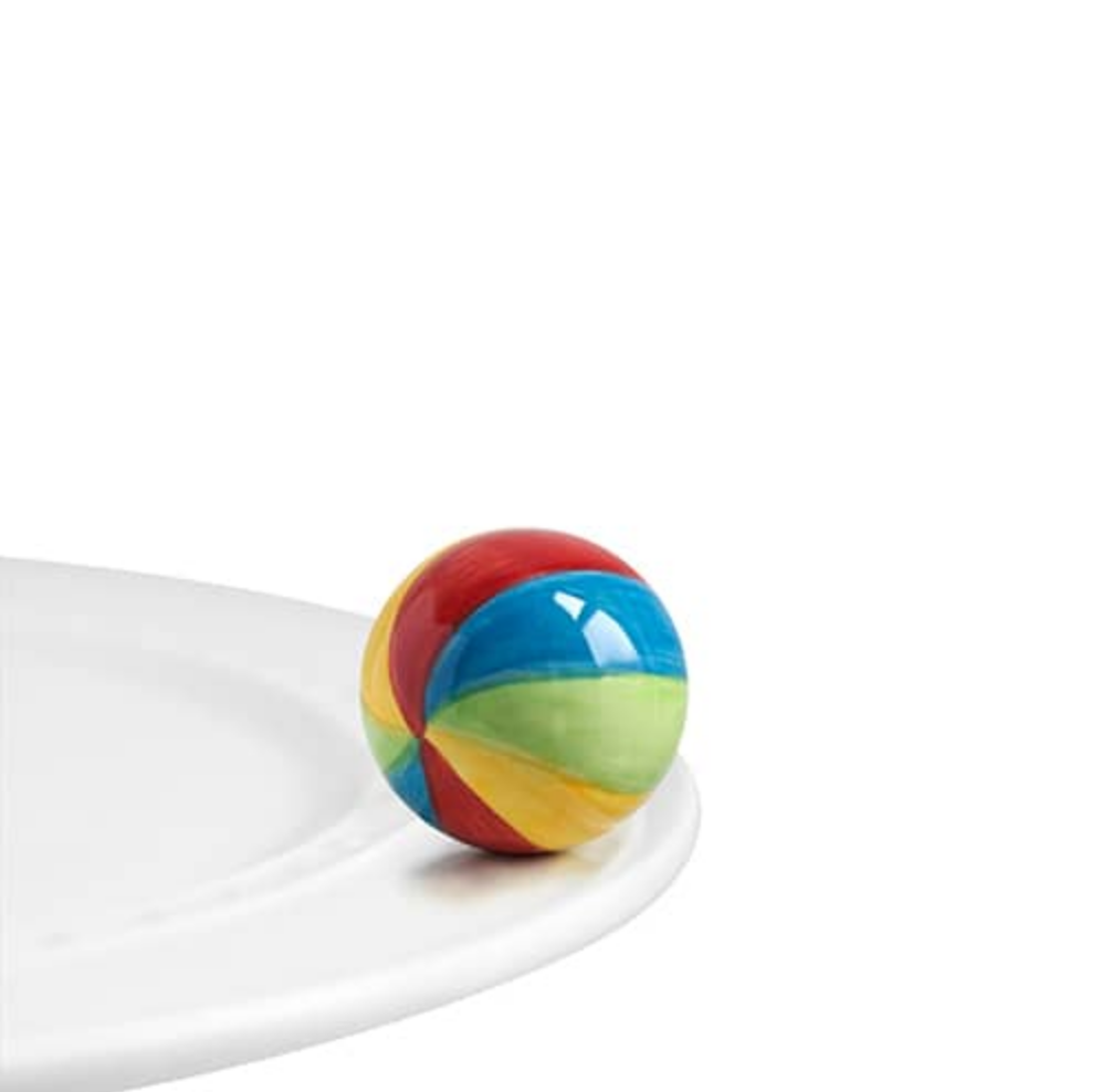 Nora Fleming have a Ball Mini ceramic attachment featuring a colorful beach ball design—perfect for summer parties and poolside entertaining. Available at Be Charmed.