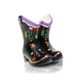 A miniature decorative cowboy boot Nora Fleming Mini with colorful floral patterns and a purple rim. Available at Be Charmed