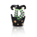 A Nora Fleming mini of a witch's feet with green and purple stockings and black shoes, adorned with gold stars. Available at Be Charmed