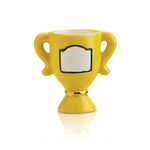 A yellow trophy-shaped dish charm with a blank label design in the center for personalization. Available at Be Charmed