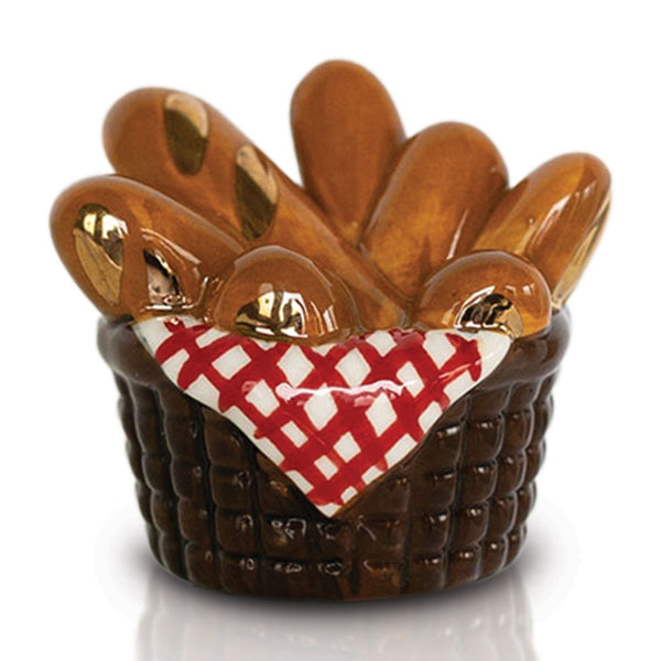 Nora Fleming Mini You Knead This bread-themed interchangeable decor for kitchen and entertaining displays. Available at Be Charmed