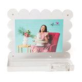 Decorative photo frame with a woman in a pink dress and floral arrangement on a green background. Available at Be Charmed