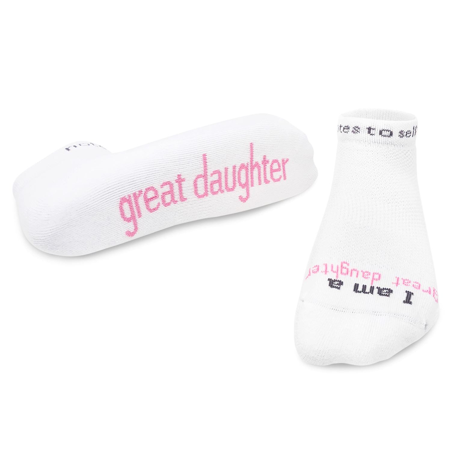 Two white socks with pink text on a white background. Available at Be Charmed