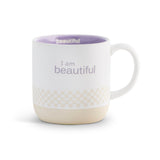 White mug with purple interior and 'I am beautiful' text on a white background. Available at Be Charmed