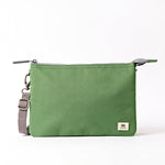 A lightweight and sustainable Artichoke Ori Carnaby Crossbody bag featuring three secure interior compartments, available at Be Charmed.