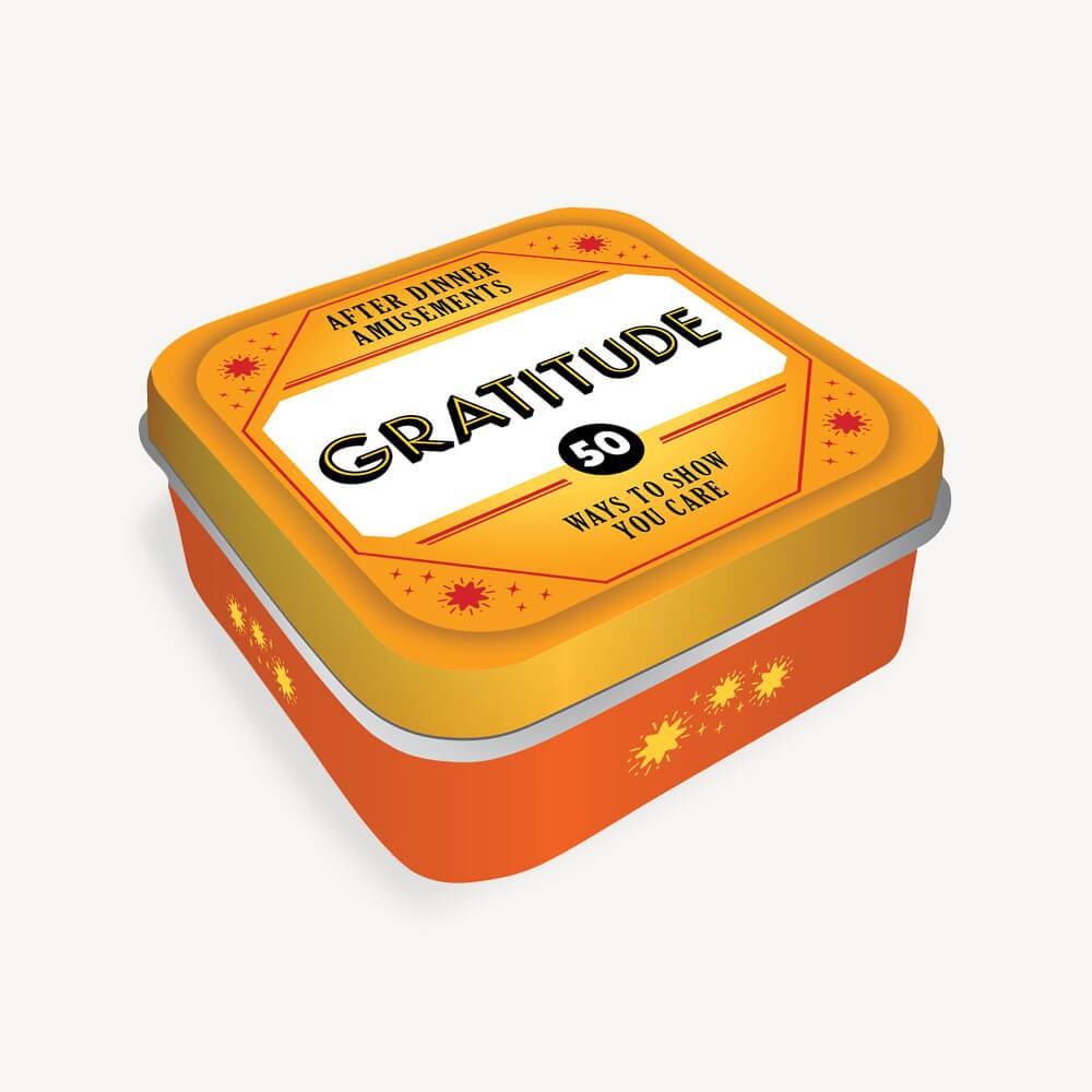 Gratitude Game Tin by On-the-Go Amusements – compact travel-sized card set with thoughtful prompts to inspire reflection, mindfulness, and gratitude for all ages, available at Be Charmed.