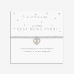 Bracelet with heart charm on a white card with text. Available at Be Charmed