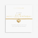 Gold heart bracelet on a 'Happy 60th Birthday' card from A Littles & Co. Available at Be Charmed