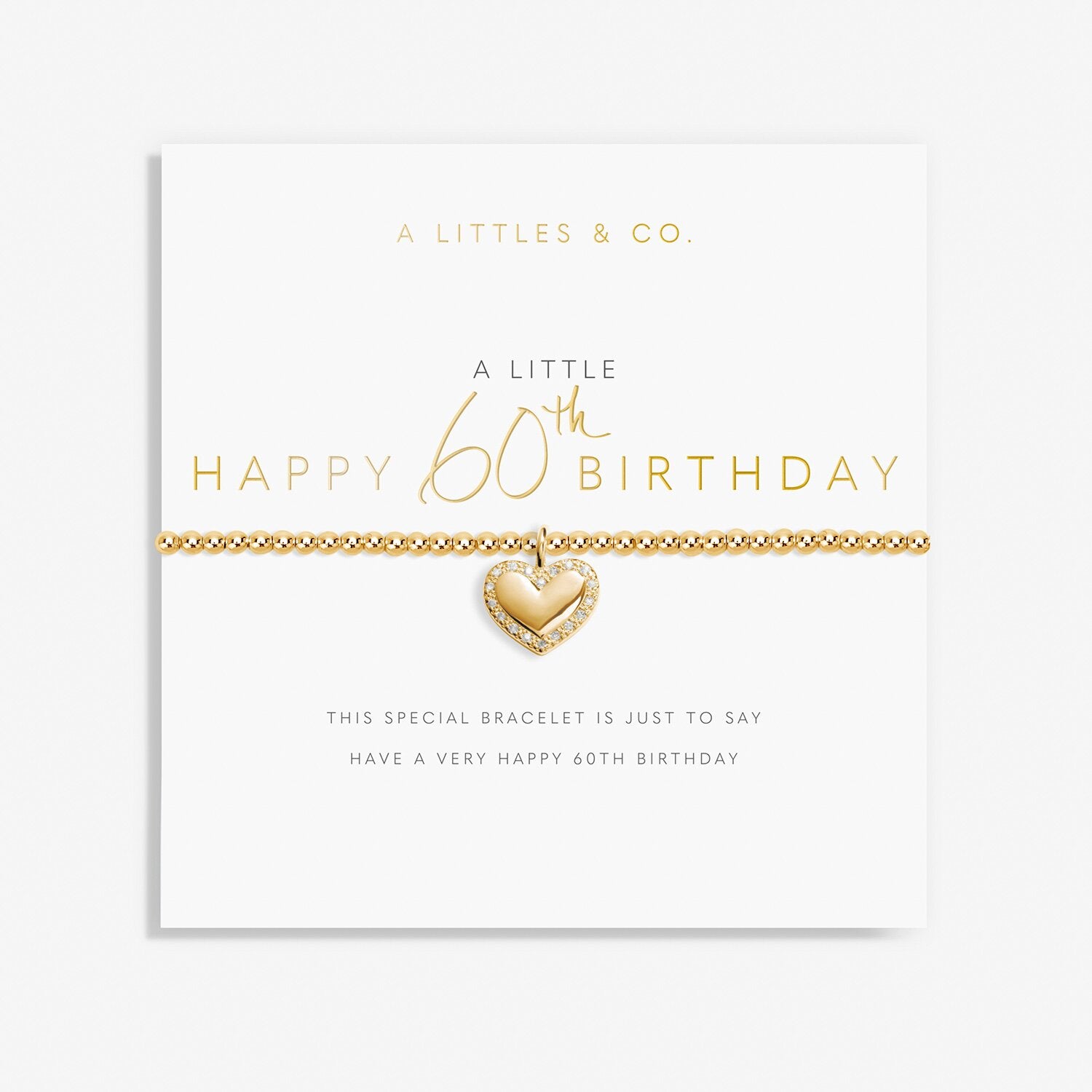 Gold heart bracelet on a 'Happy 60th Birthday' card from A Littles & Co. Available at Be Charmed
