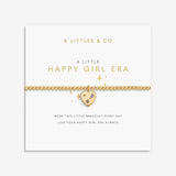 Gold bracelet with heart charm on a white card with 'A Littles & Co.' text. Available at Be Charmed