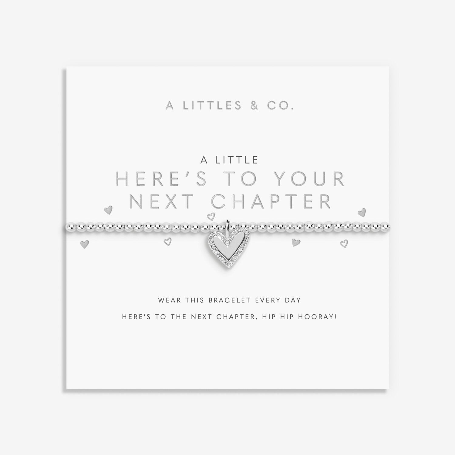 Bracelet with heart design on a white card with text, featuring 'A Littles & Co.' brand. Available at Be Charmed