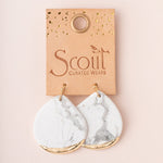 Scout Curated Wears Earrings Stone Dipped Teardrop Fossil Coral/Gold;  Marble-patterned earrings on a Scout Curated Wears card against a beige background. Available at Be Charmed