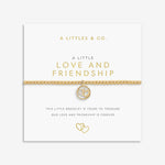 Gold bracelet on a white card with 'A Littles & Co.' branding. Available at Be Charmed