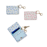 Open view of Set of three floral Hydrangea ID Wallet keychains on a white background. Available at Be Charmed 