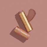 Opened Poppy & Pout Lip Tint. Available at Be Charmed