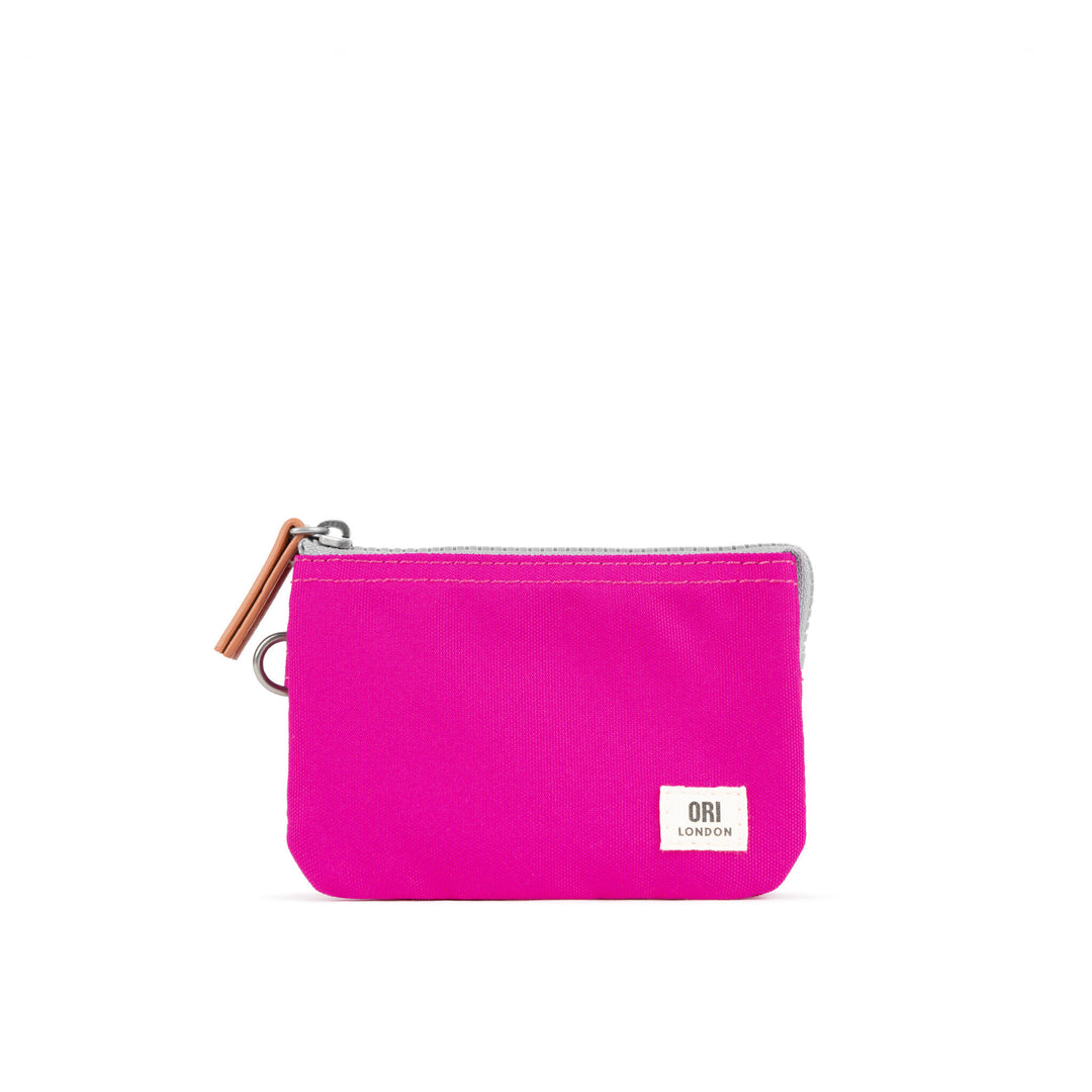 A compact, weather-resistant Candy Ori Carnaby canvas zip-around wallet with internal card slots, available at Be Charmed.