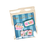 Packaged set of colorful acrylic magnets with text on a beige background. Available at Be Charmed
