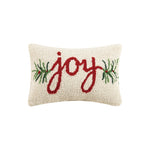 Decorative pillow with 'joy' and greenery on a white background. Available at Be Charmed