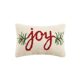 Decorative pillow with 'joy' and greenery on a white background. Available at Be Charmed