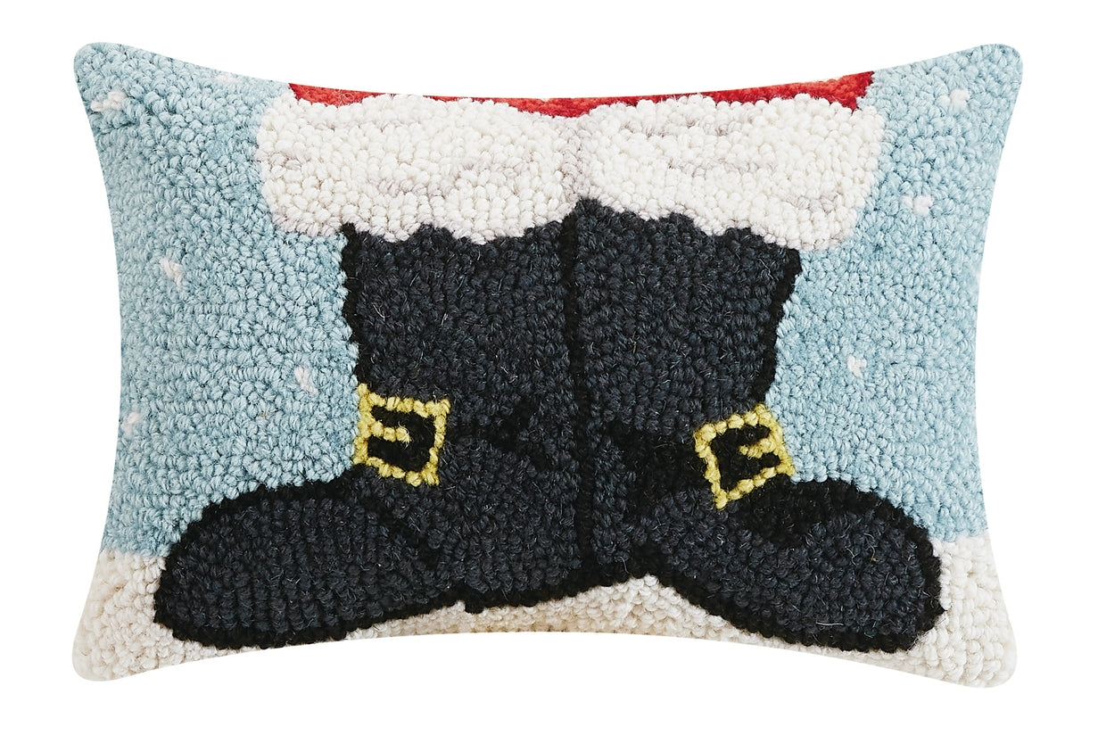 Decorative pillow with black boots and yellow buckles on a blue and red background. Available at Be Charmed