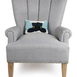 Gray armchair with a decorative pillow featuring a cat design on a white background. Available at Be Charmed