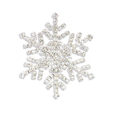 Decorative snowflake Pin with rhinestones on a white background. Available at Be Charmed. 