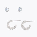 Set of silver hoop earrings on a white background. Available at Be Charmed