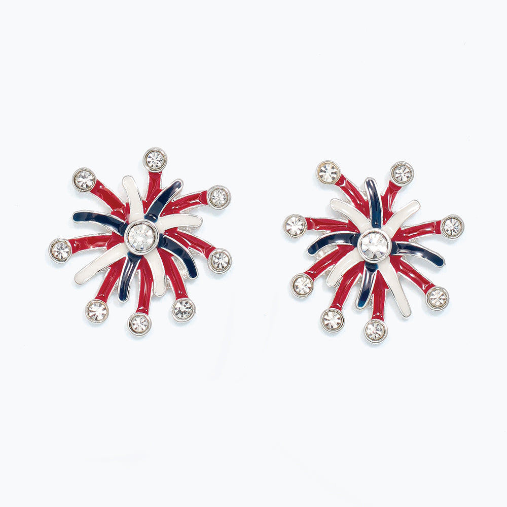 Pair of earrings with red, white, and blue starburst design on a white background. Available at Be Charmed