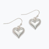 Heart-shaped silver earrings on a white background. Available at Be Charmed