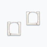 Pair of silver hoop earrings on a white background. Available at Be Charmed